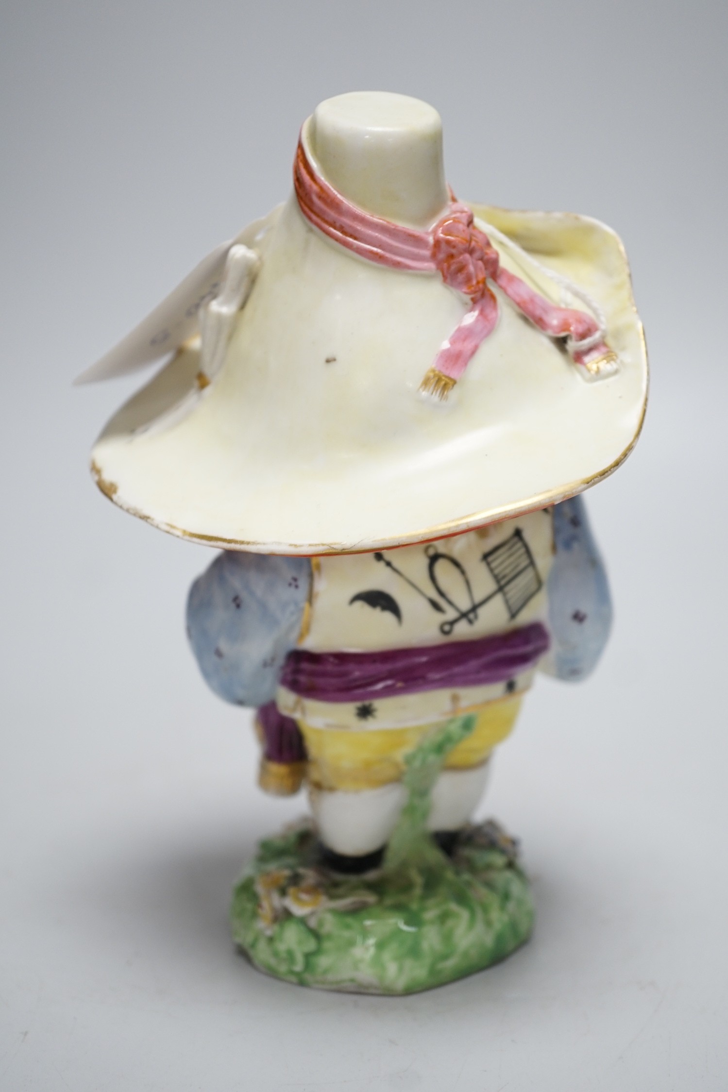 A Derby Mansion House Dwarf holding his large belly incised 227, star mark for Issac Farnsworth c.1790-1800, 17cms high